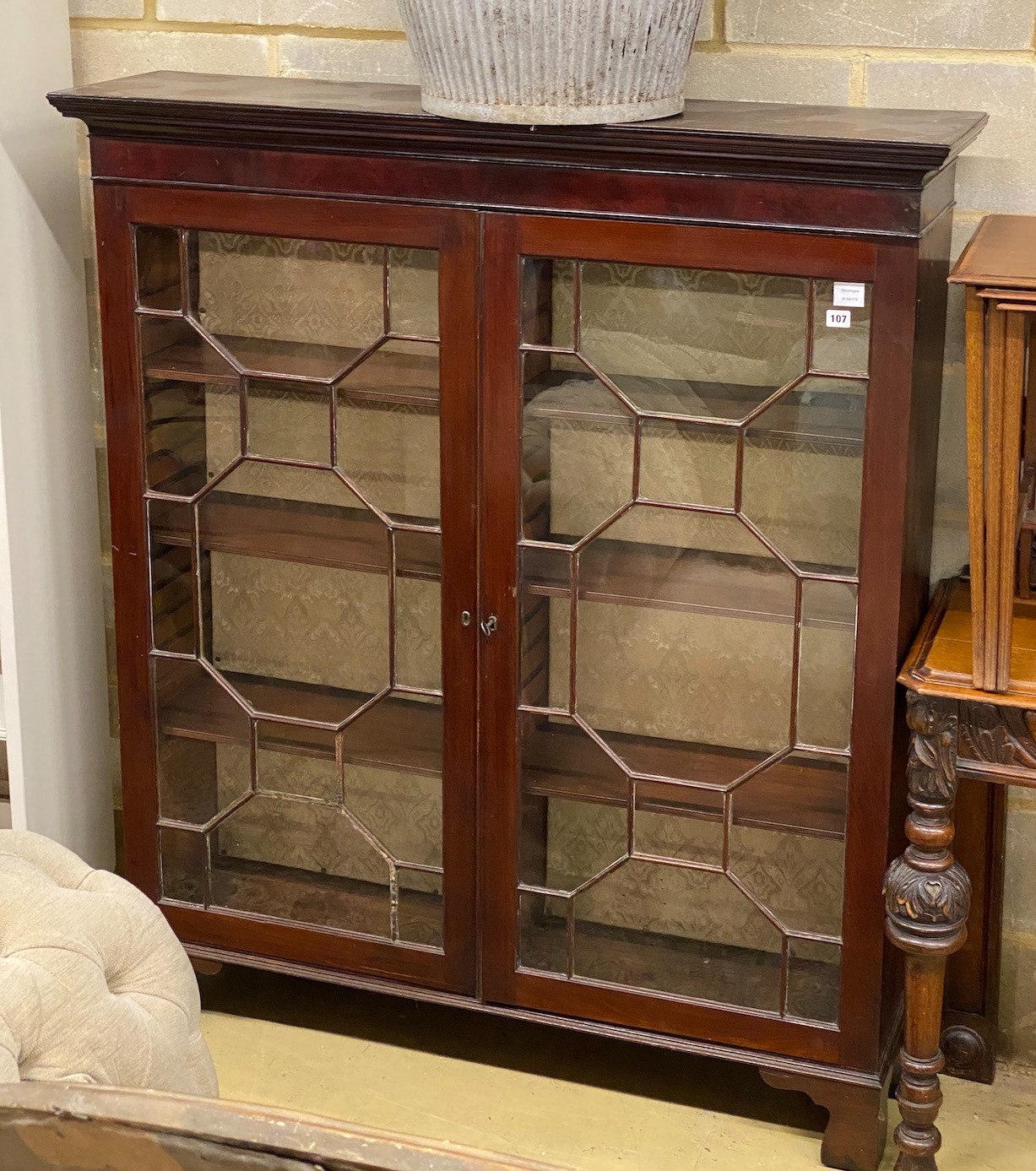 A George III and later mahogany astragal glazed bookcase cabinet, with shelved interior, width 130cm, depth 32cm, height 152cm